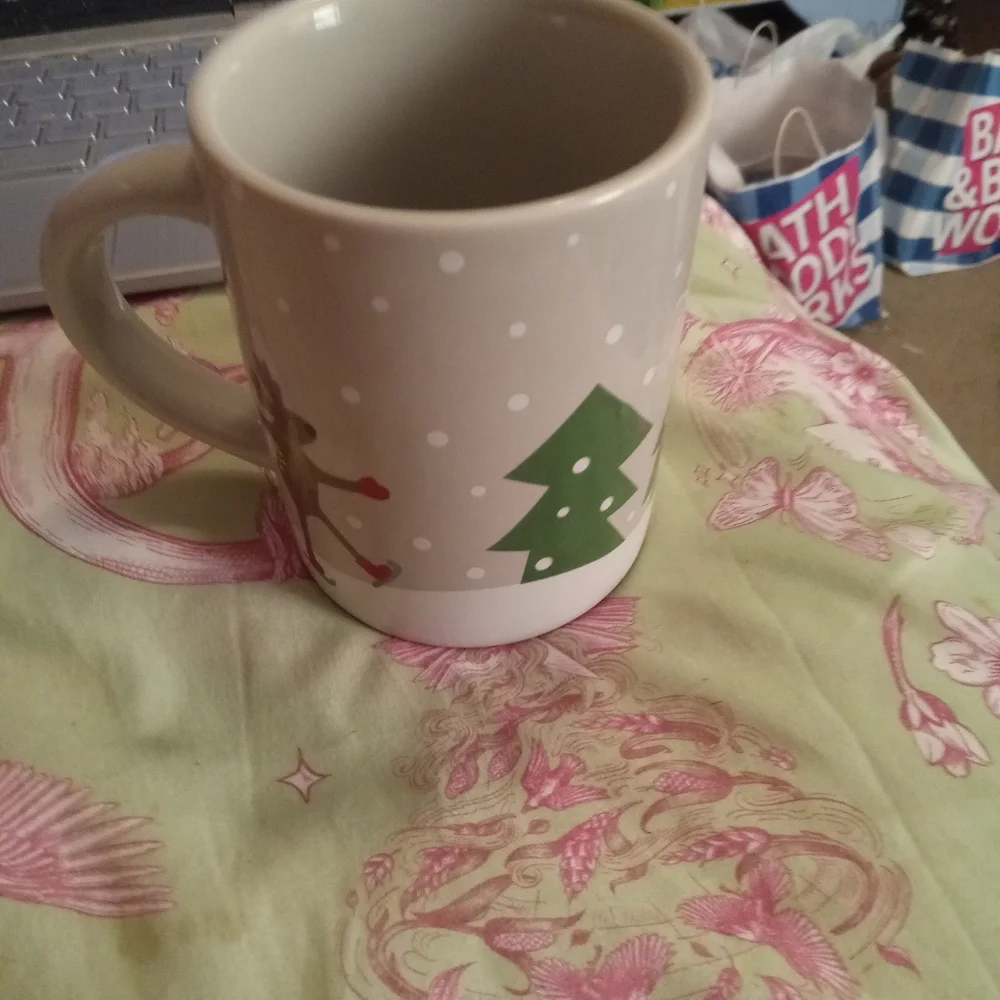 Ice Skating Reindeer Coffee Mug